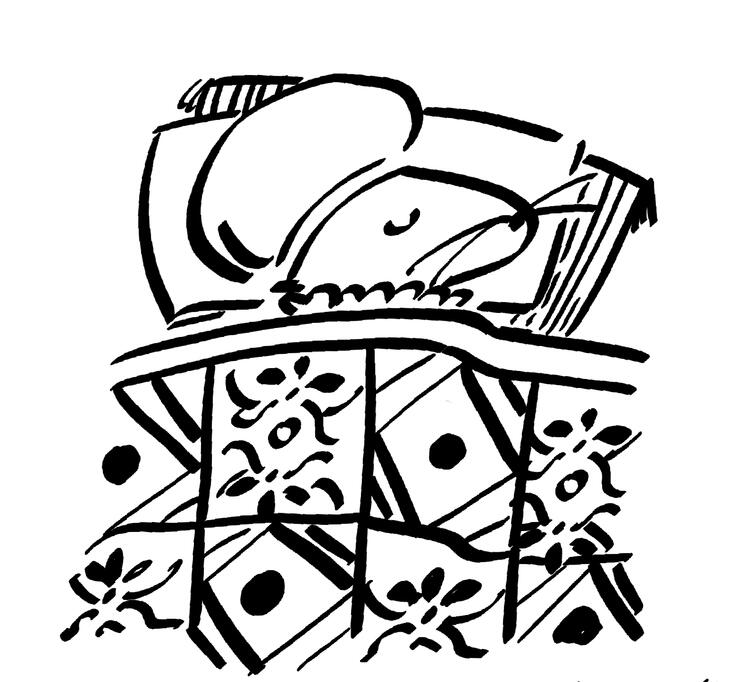 A mouse wearing a bonnet is sleeping under a heavily patterned quilt.